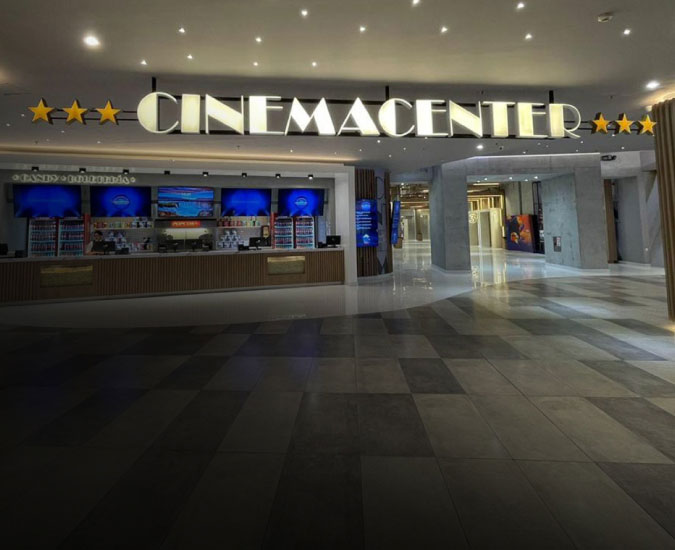 Cinemacenter lobby and refreshment stand with the Cinemacenter sign overhead.