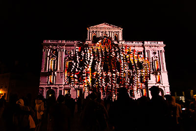 Art work by Filip Hodas projection mapped on to the walls of the Archbishop’s Palace in Prague