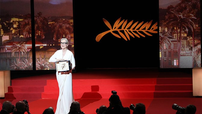 Meryl Streep accepting her award at the Ceremonie Ouverture. Photo credit: Mathilde Petit