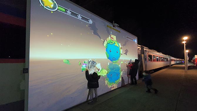 The interactive game zone is powered by two Christie DWU630-GS laser projectors